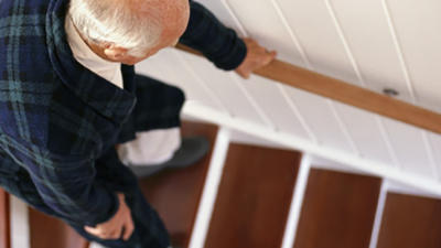 Old man going down stairs